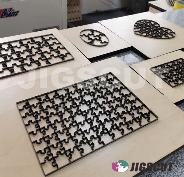 Jigsaw puzzle cutting, puzzle making, 600 ton puzzle die cutting